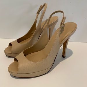 Classic Cole Haan pump.  4” heel with 1” platform.